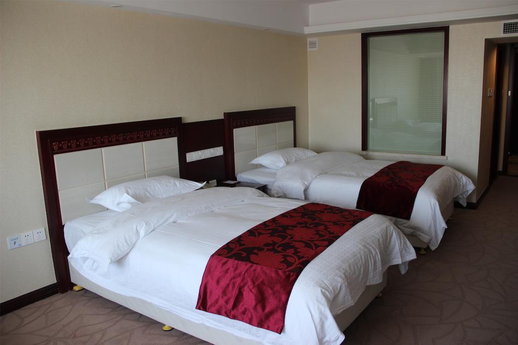 Dalian Southern Airline Pearl Hotel Quarto foto